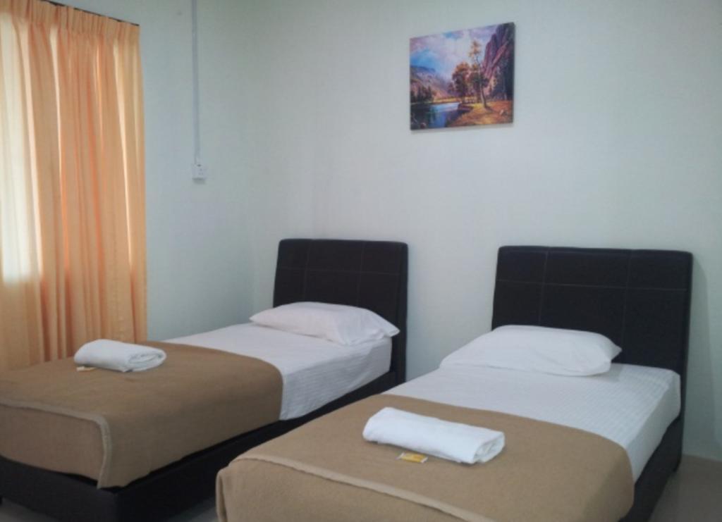 Huda Inn Pantai Cenang  Habitación foto